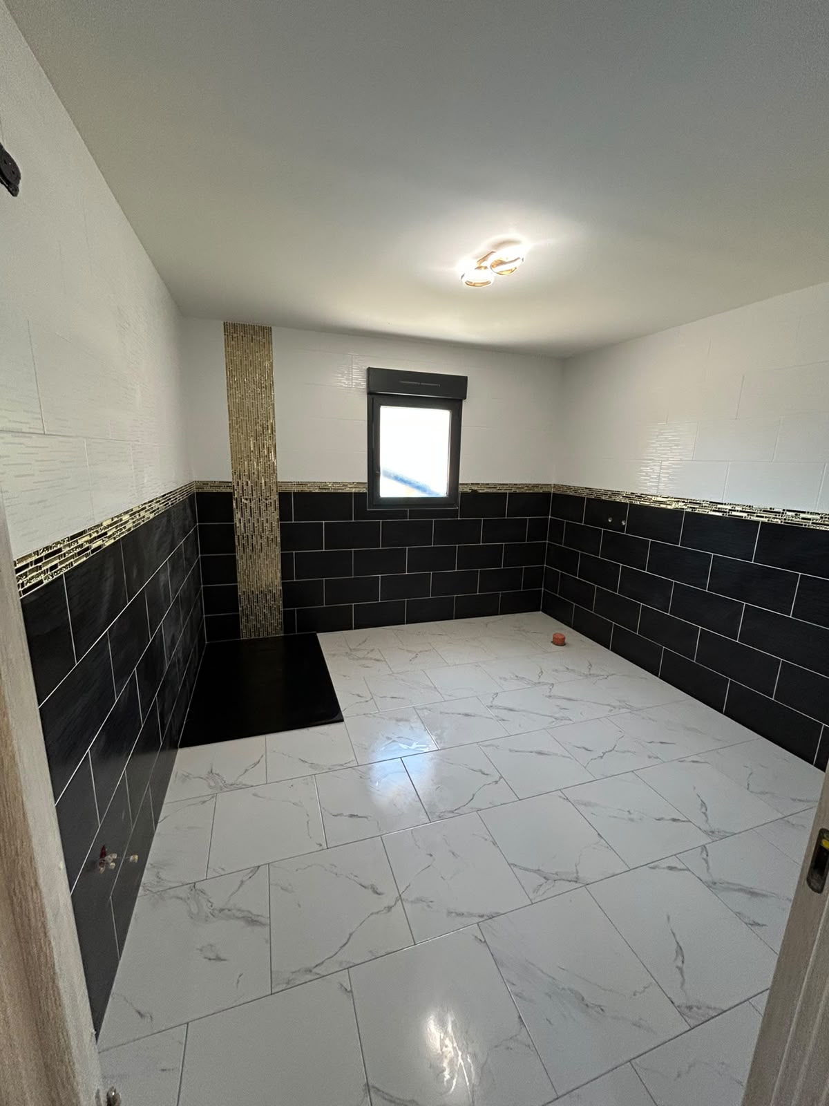 Carreleur terrasse - Habillage d’une dalle existante<br />
